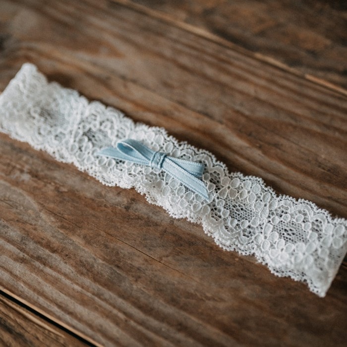 Strumpfband weiss blau mit Schleife Strumpfband weiss blau mit Schleife